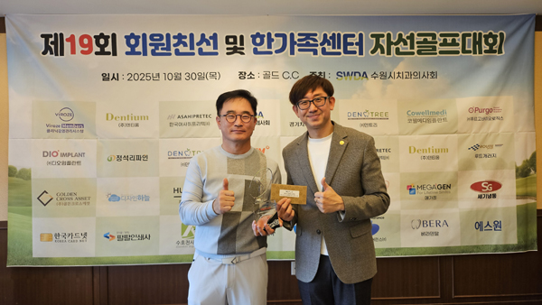 메달리스트 기세일 회원(좌)과 민봉기 회장(우)